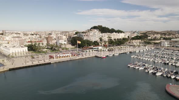 Cartagena touristic port with cinematic cityscape, Spain. Aerial panoramic view