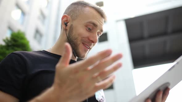 Business man making a video call alt