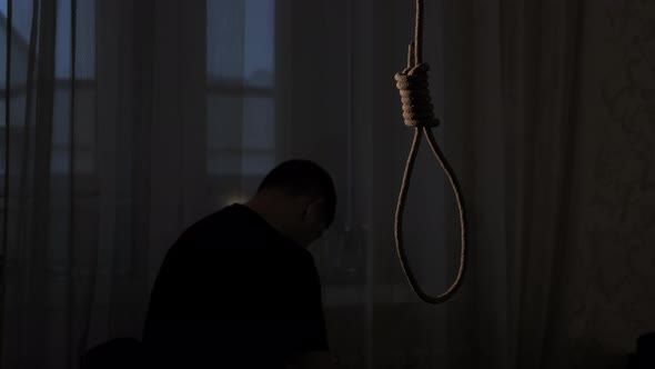 Depressed Man Contemplating Suicide alt