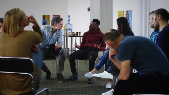 Black Man Talking About Videogames Addiction During Support Meeting alt