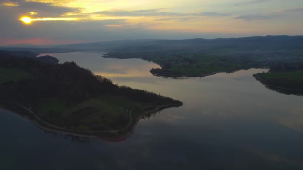 Cloud Reflection in Lake Czorsztyn in Poland, Beautiful Sunset at Dusk alt