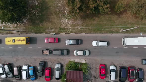 Aerial Drone Flight Top Down View of Stuck Cars and Buses at Rush Hour Heavy Traffic Jam