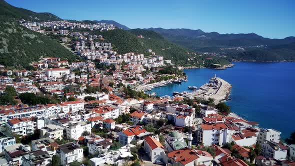 The top view from the drone of Kas resorts, bay, yahts, city in Mugla in Turkey alt