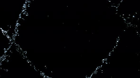 Super Slow Motion Shot of Twisting Water Splash at 1000Fps Isolated on Black Background alt