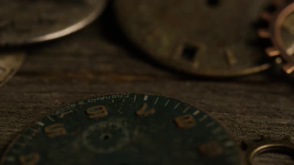Rotating stock footage shot of antique and weathered watch faces  alt