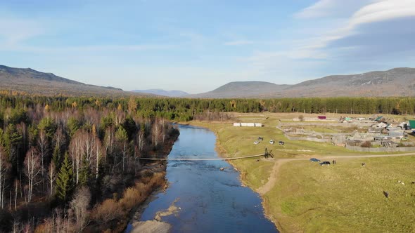 Aerial View of the Footbridge Over the River South Ural Russia alt