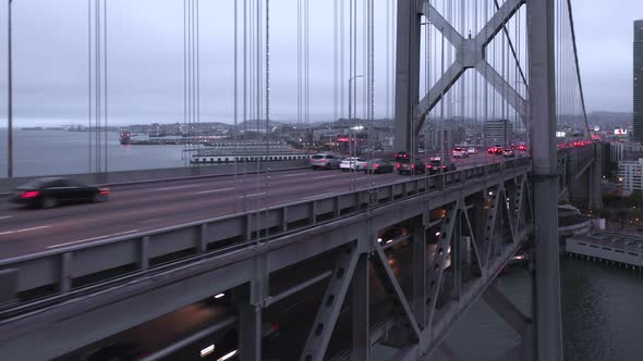 Close Up Aerial of Modern Industrial Construction of the Bridge on Cloudy Day alt
