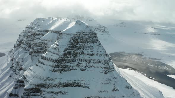 Bird's-eye View of the Snowy Mount Kirkjufetl. Iceland, Winter