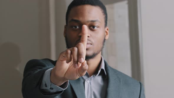 Young African American Lawyer in Suit Man Standing in Office Waving Index Finger Showing NO Gesture alt