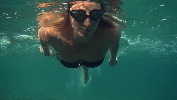 Underwater  Swim Bikini Woman. Air Bubbles In Water. Girl Having Fun Sea. Vacation Turkey Trip. alt
