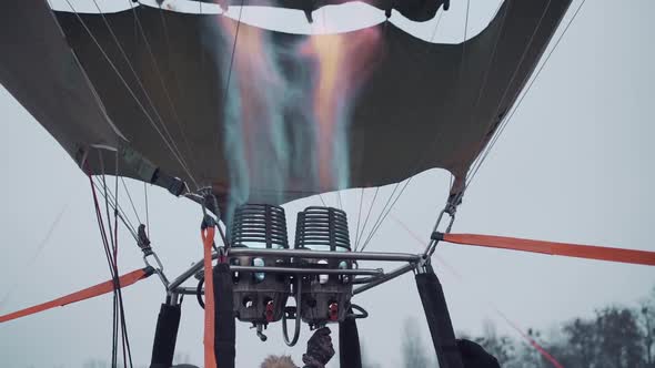 Hot Air Balloon Festival Evening Winter Burner Fills the Balloon with Warm Air Closeup