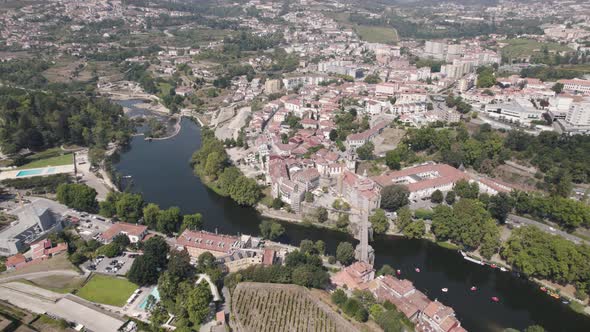 Aerial above view of the historic parish townscape and famous Sao Goncalo church, Amarante. alt