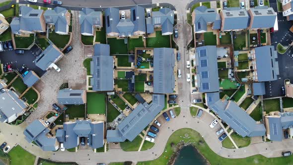 Top down view flying over modern houses in Greenhithe, Kent alt