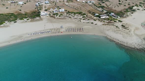Magganari beach on the island of Ios in the Cyclades in Greece seen from the sky alt