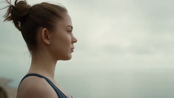 Closeup Girl Sitting Seashore Side View alt