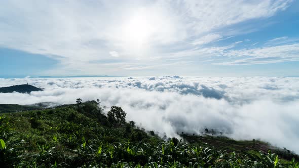 timelapse foggy or over the clouds while sunrise sky.