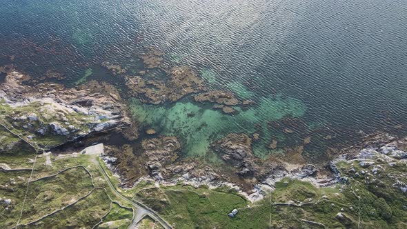 Gorgeous Coral Reef Under The Clear Blue Sea By The Rocky Coastline At The Coral Strand Beach In Con alt
