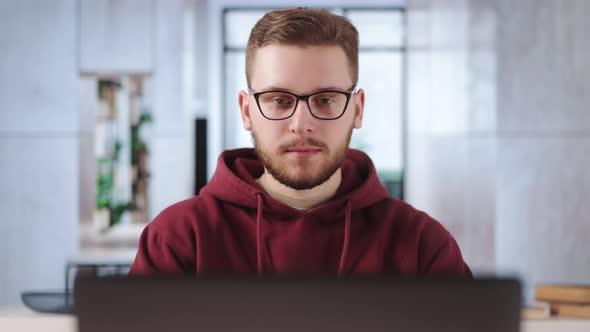 Man with Laptop Working at Office