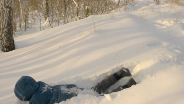 Teenager Walking in the Snowy Path alt