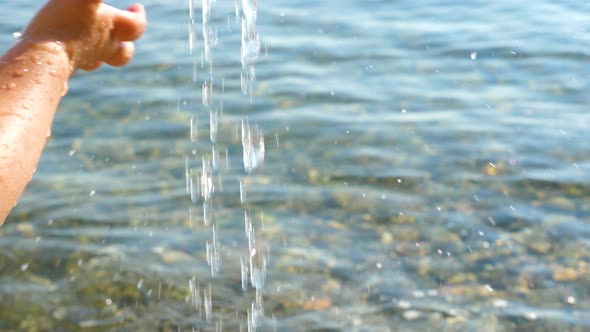 Little Traveler Playing with Water alt