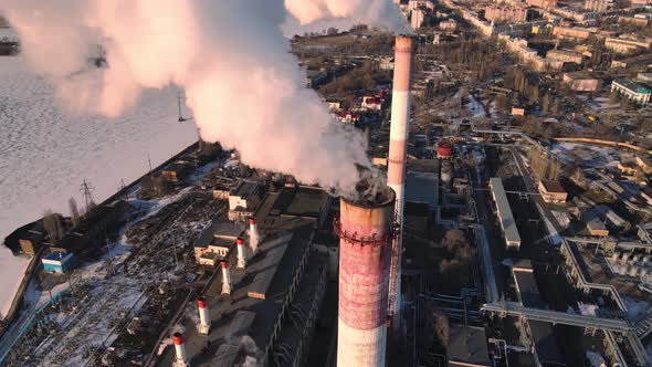 Industrial factory pipes emission carbon gases in atmosphere. alt