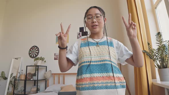 Asian Teenage Girl Filming Video Blog alt