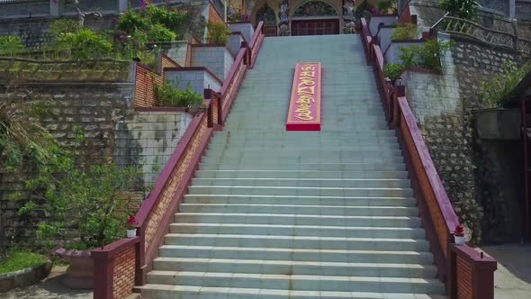 Drone Camera Shows Beautiful Stairs To Buddhist Temple alt