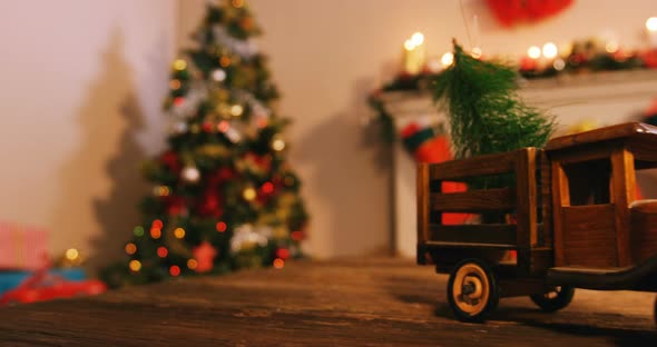 Toy truck carrying a christmas tree 4k alt