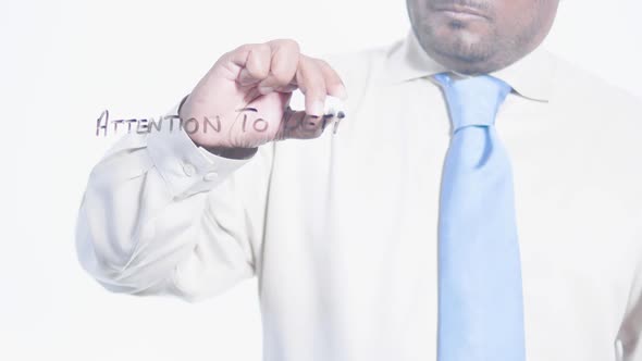 Indian Businessman Writes Attention To Detail alt