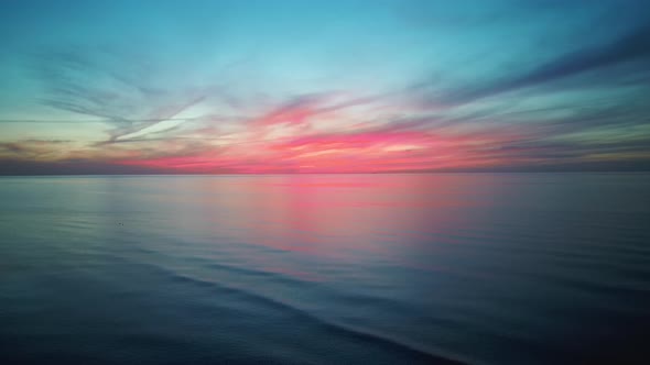 Aerial Drone Shoot. Sunrise Over the Sea. Colorful Sunset on the Baltic Sea, Latvia.4K Video alt