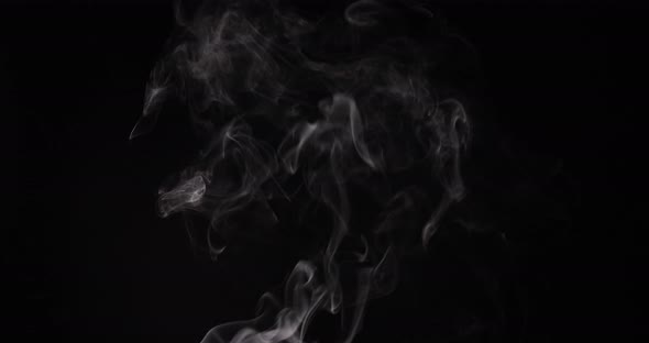 Effect of smoke fading away with a wave effect on a background. VFX Video Element alt
