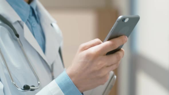 Nurse texting on smartphone