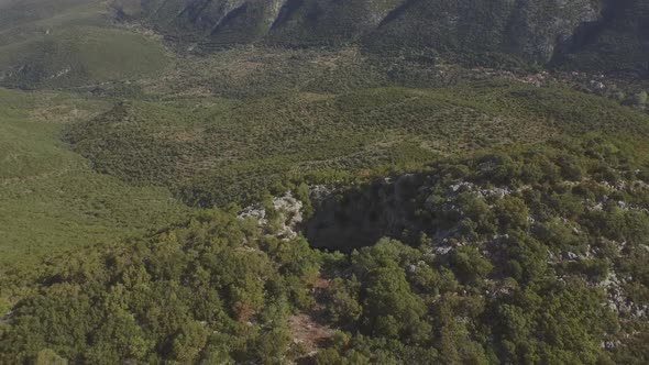 Aerial view: mysterious Fairy garden Neraidokipos on mount Gouvala in Greece alt