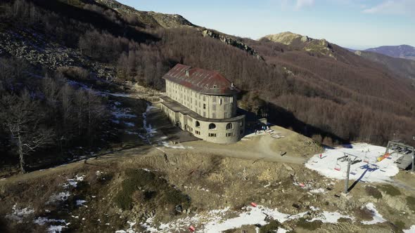 Aerial, Alps Mountains Partially Covered With Snow In Italy