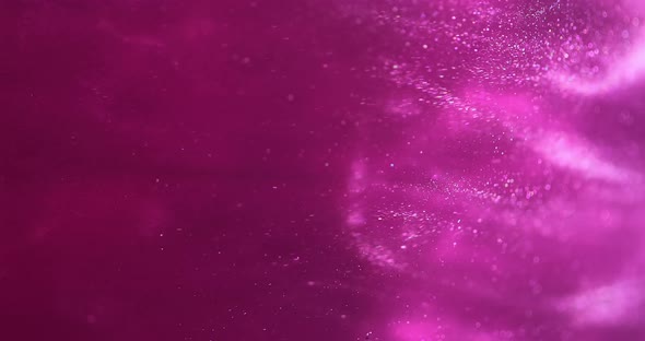 Pink Glittery Paint Creating Abstract Cloud Formations. Art Backgrounds. Fuchsia Color Ink Is alt