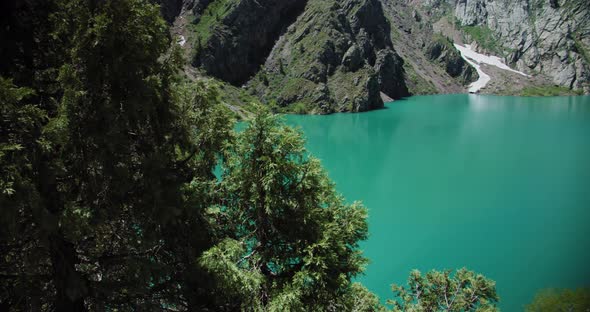 Mountain Lake of green and blue color Urungach. Located in Uzbekistan, Central Asia. 1 out of 10 alt