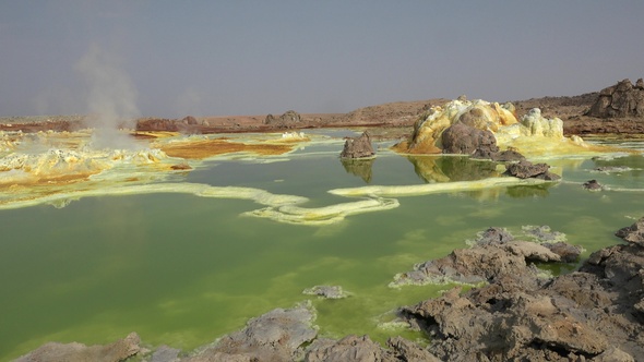 The colorful landscape of lake in Crater of Dallol Volcano. Sulphur pools of mineral in Ethiopia. alt