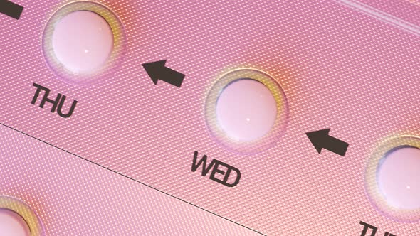 Pink birth control pill blister. Every day of a week in an endless loop. 4KHD