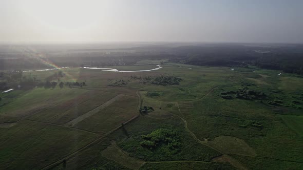 River and Green Fields in Countryside alt