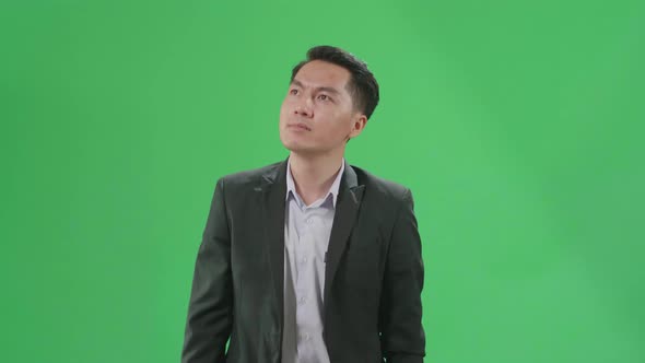 Asian Business Man Walking On Green Screen Chroma Key alt