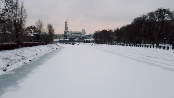 Winter aerial city view, river embankment Kharkiv