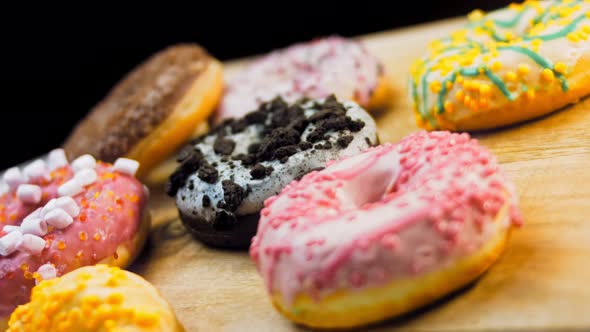 Chocolate Marshmello and Candy Donuts on a Retro Baking Tray alt
