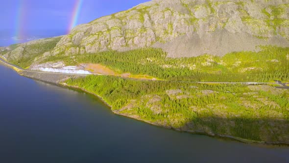 The Green Trees on the Foot of the Mountain in Norway alt