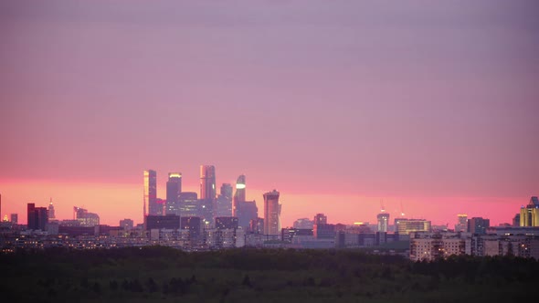 Time lapse night view of Moscow city and summer city landscape, Russia. Top view of the city at dusk