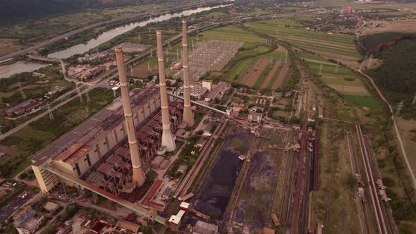 Aerial view of disaffected coal power plant, at sunset