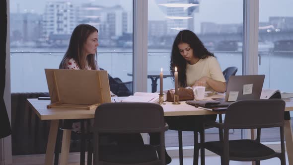University Students Studying At Table alt