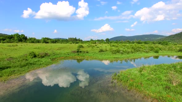 Aerial view of Jesenica river and surrounding in Croatian region Lika. alt