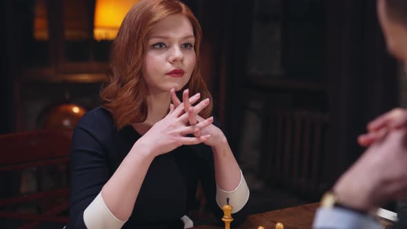 Joyful Girl Chess Player Shakes Hands alt