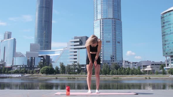 Woman working out in city