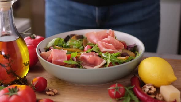 Making Pear Arugula and Blue Cheese Salad at Domestic Kitchen alt